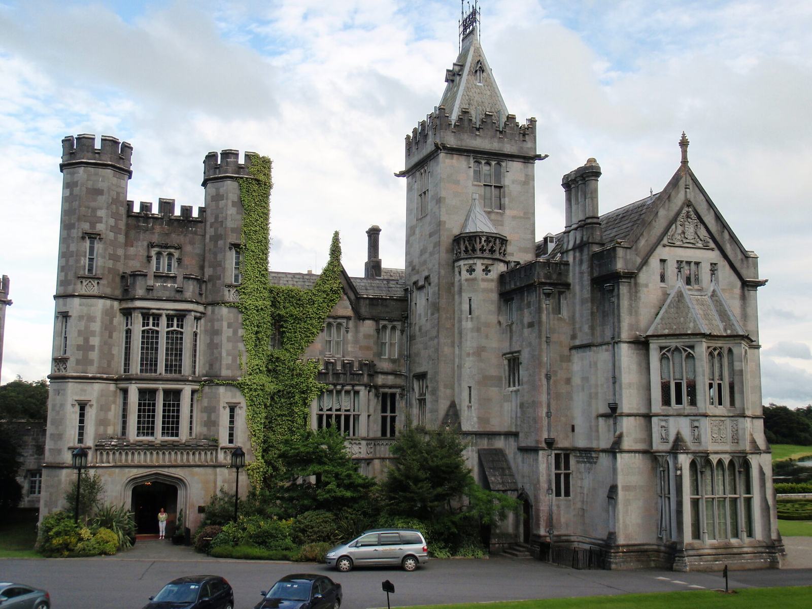 Adare Manor's neo-Gothic facade across its County Limerick parkland